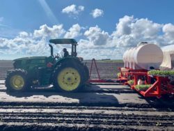 Planting crops with Tractor
